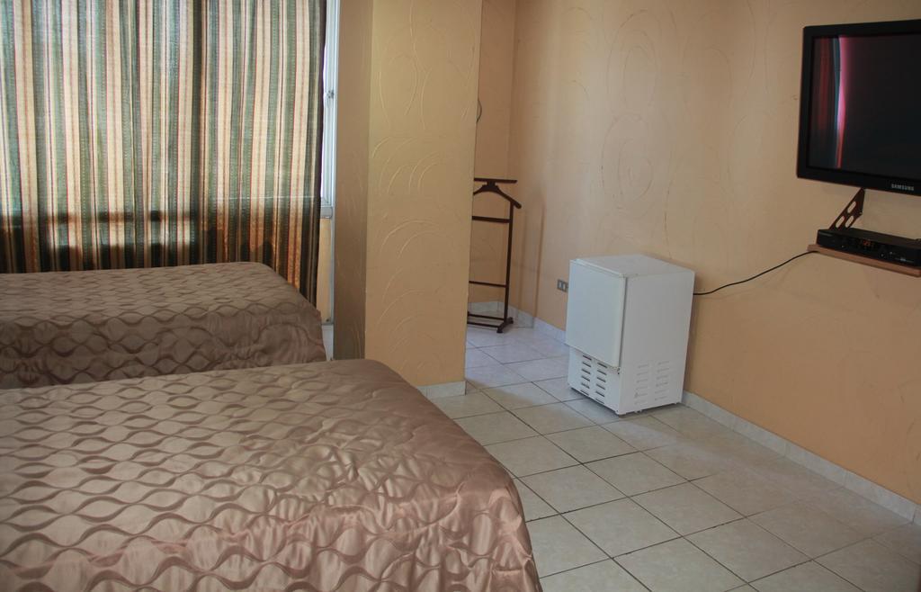 Hotel La Torre Guayaquil Szoba fotó